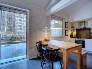 Discover a stunning property with a modern kitchen and dining area.