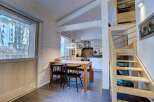 Discover a charming property with a cozy dining area, perfect for intimate gatherings.