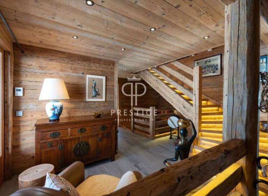 Experience rustic elegance in this stunning property, featuring exquisite wooden interiors and a warm, inviting ambiance.