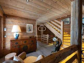 Experience rustic elegance in this stunning property, featuring exquisite wooden interiors and a warm, inviting ambiance.