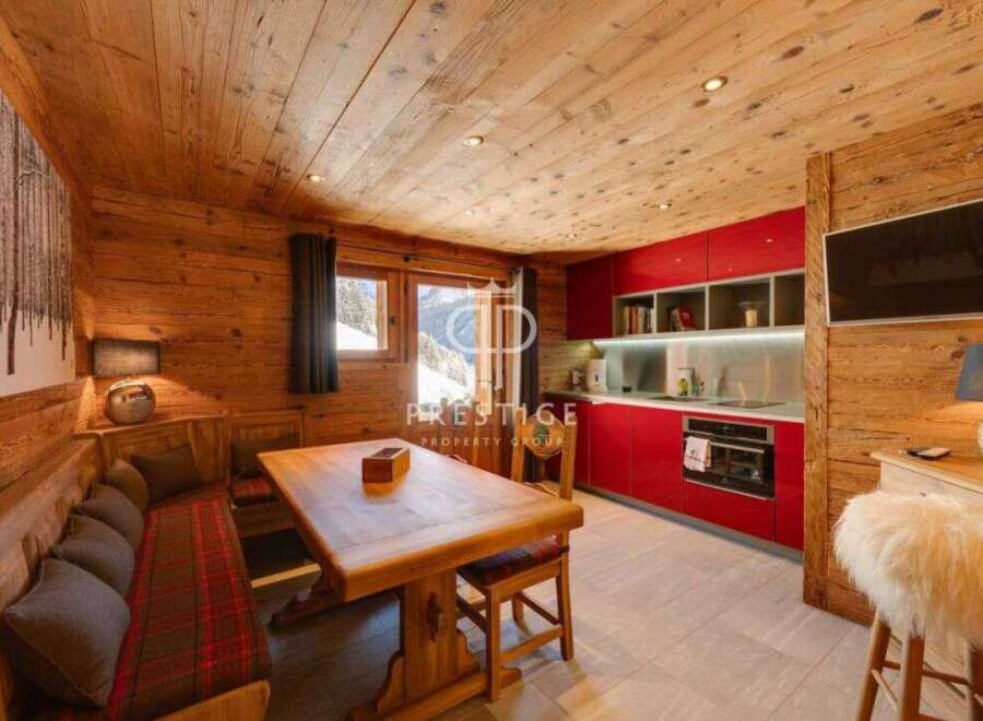 Experience rustic charm in this stunning property, featuring warm wooden interiors and a cozy atmosphere.