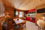 Experience rustic charm in this stunning property, featuring warm wooden interiors and a cozy atmosphere.