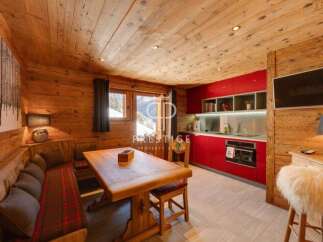 Experience rustic charm in this stunning property, featuring warm wooden interiors and a cozy atmosphere.