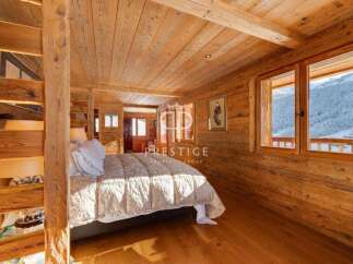 Experience the warmth of this stunning wooden chalet, a perfect blend of rustic charm and modern comfort.