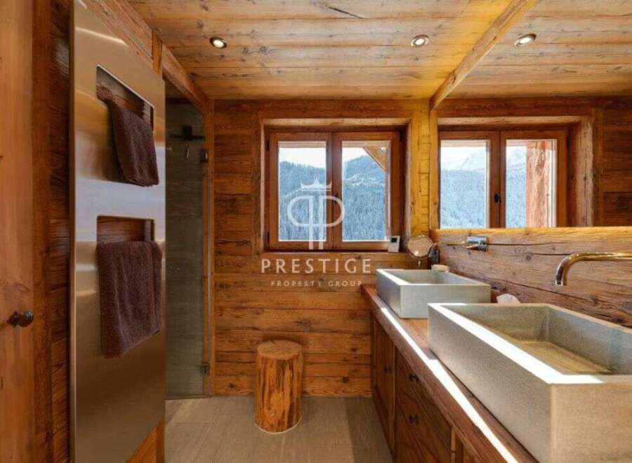 Experience rustic luxury in this stunning bathroom.