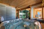 Indulge in luxury with this stunning property featuring a private jacuzzi, perfect for relaxation.