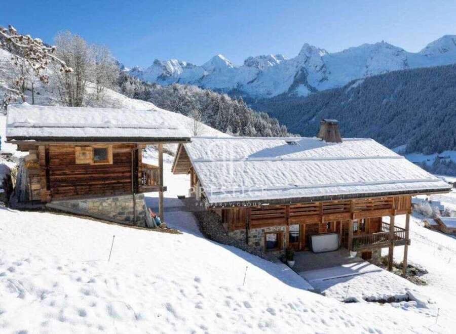 Experience the ultimate alpine escape in this stunning chalet nestled amidst a snowy landscape.