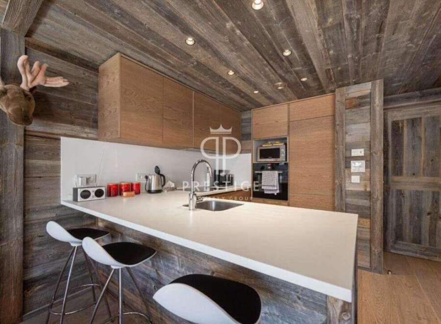 Experience rustic elegance in this stunning kitchen.
