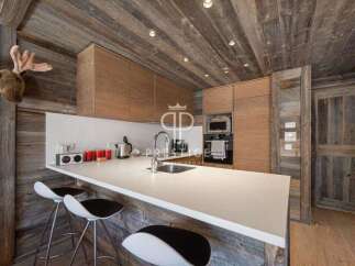 Experience rustic elegance in this stunning kitchen.
