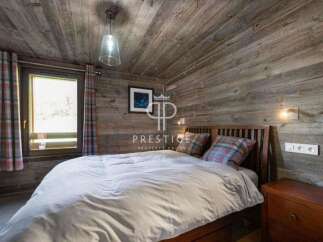 Experience rustic charm in this cozy bedroom.