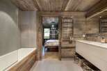 Experience rustic elegance in this stunning bathroom.