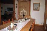This charming property boasts a rustic dining area, perfect for gatherings.