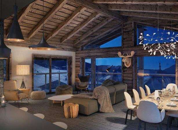 Experience luxury living in this stunning chalet, boasting a cozy ambiance with wooden beams and a breathtaking mountain view.