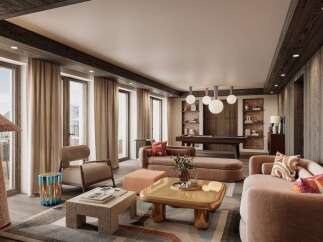 This luxurious living space boasts floor-to-ceiling windows offering breathtaking mountain views, complemented by a stylish and modern interior design.