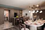 This stunning apartment boasts a modern open-plan kitchen with sleek wooden cabinetry and a spacious island, perfect for entertaining.