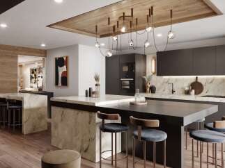 This stunning kitchen boasts a modern design with dark gray cabinetry, marble countertops, and a large island with seating.