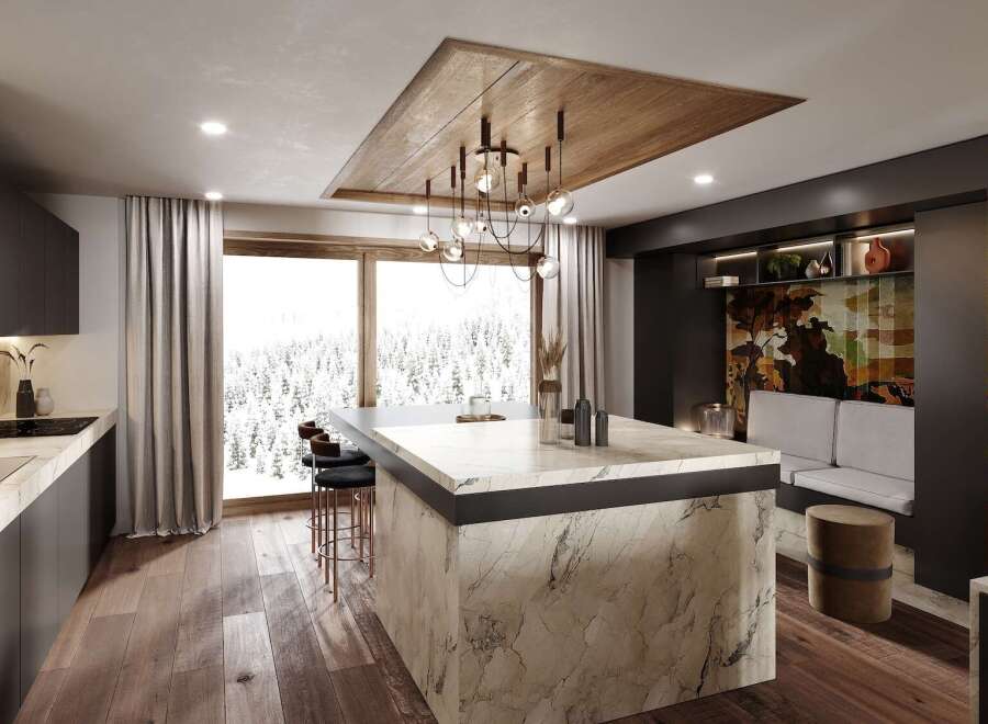 This stunning kitchen boasts a modern design with dark cabinetry, marble countertops, and a statement island.