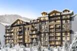 Luxury ski-in/ski-out apartments in the French Alps, offering breathtaking mountain views and modern amenities.