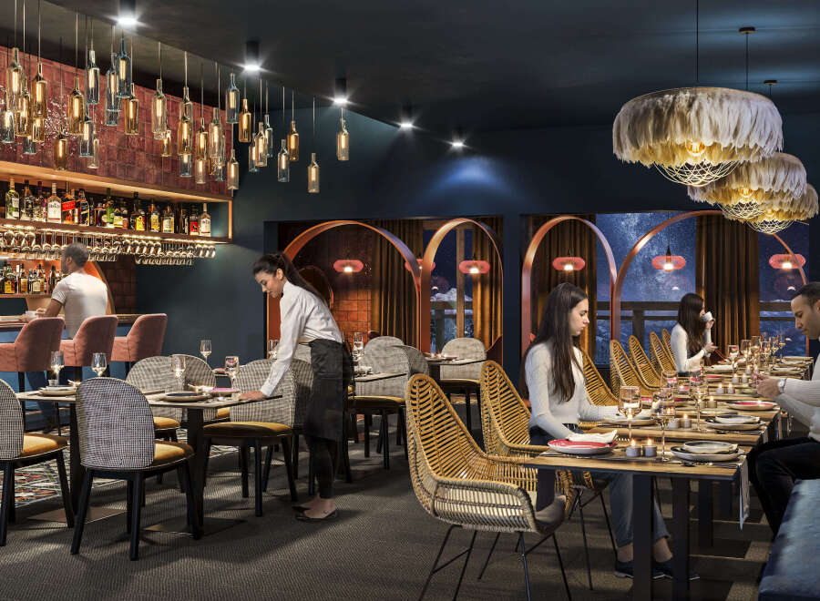 This stunning restaurant boasts a unique design, featuring a stylish bar with hanging bottle lights and a sophisticated dining area with a mix of modern and rustic chairs.