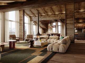 This stunning chalet boasts a spacious open-plan living area with floor-to-ceiling windows offering breathtaking mountain views, a cozy fireplace, and luxurious furnishings.
