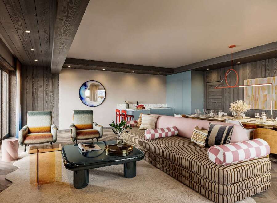 This stunning living space boasts a chic and modern design, featuring a comfortable striped sofa, stylish armchairs, and a sleek coffee table.