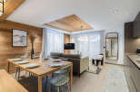 Experience luxury living in this stunning property, featuring a modern design with a touch of rustic charm.