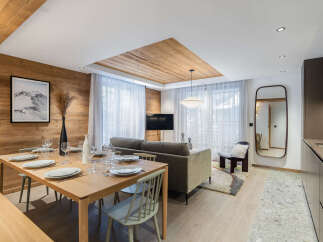 Experience luxury living in this stunning property, featuring a modern design with a touch of rustic charm.