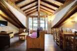 Discover the charm of this stunning property, featuring a unique architectural design with exposed wooden beams.