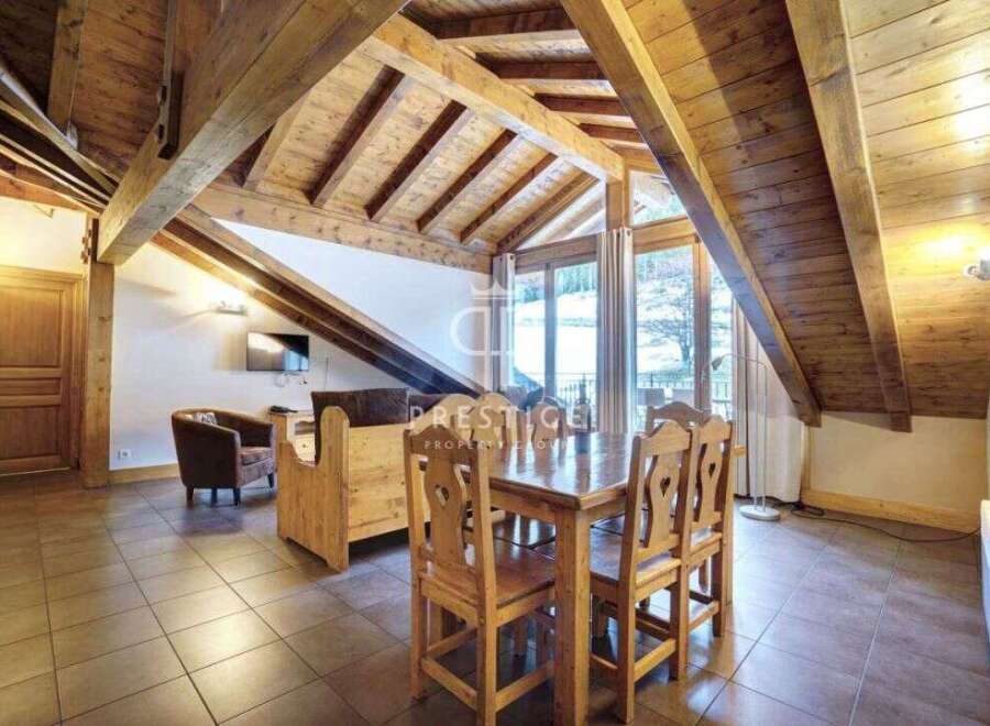 Discover the charm of this stunning property, featuring a beautifully crafted wooden interior and a cozy atmosphere.