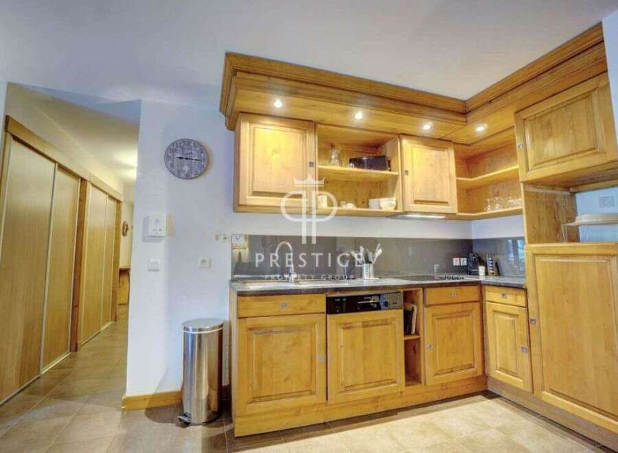 Discover a charming kitchen with wooden cabinetry, offering a warm and inviting atmosphere.