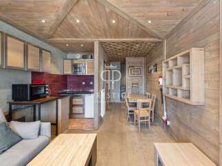 Discover the charm of this cozy property, featuring stunning wooden accents throughout.