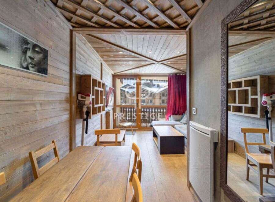 Discover a cozy retreat with this charming property, featuring warm wooden accents and a stylish interior.
