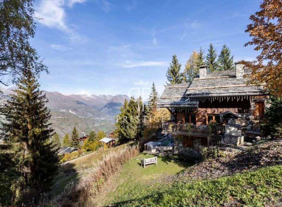 Nestled in a picturesque mountain setting, this stunning property offers breathtaking views.