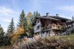 Discover a stunning chalet nestled amidst the serene beauty of nature.