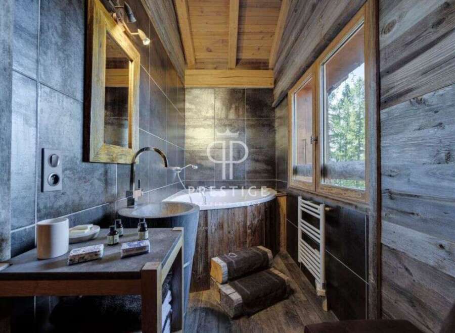 Experience rustic luxury in this stunning bathroom.