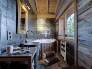Experience rustic luxury in this stunning bathroom.