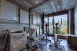 This stunning property boasts a private home gym, perfect for maintaining your fitness routine.
