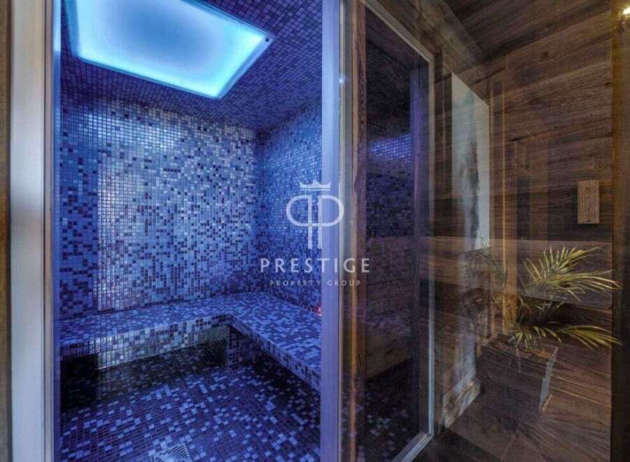 Indulge in luxury with this stunning property featuring a private spa.