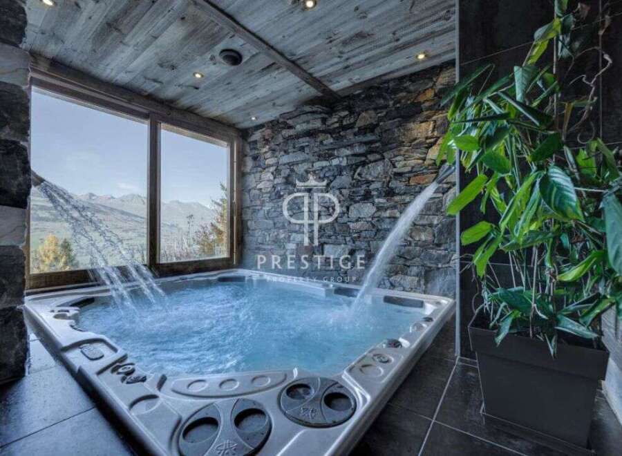 Indulge in luxury with this stunning property featuring a private jacuzzi.