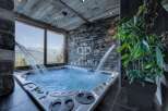 Indulge in luxury with this stunning property featuring a private jacuzzi.