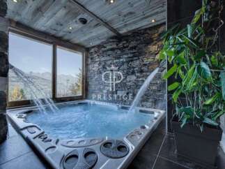 Indulge in luxury with this stunning property featuring a private jacuzzi.