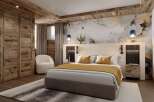 This luxurious bedroom boasts a stunning marble-effect wall, complemented by a cozy wooden ceiling and floor.