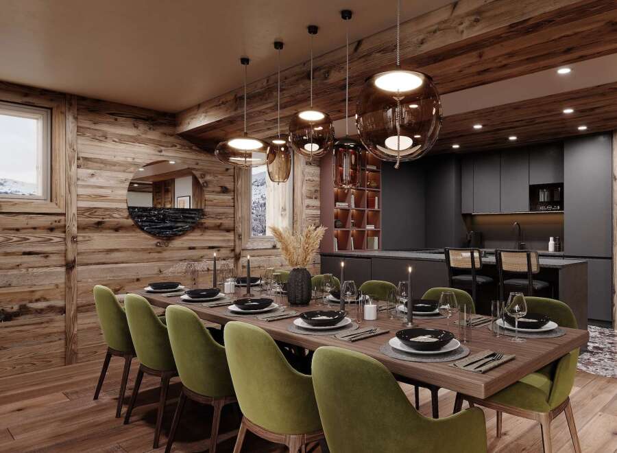 This stunning chalet boasts a spacious dining area with a long wooden table, surrounded by plush green velvet chairs, perfect for intimate gatherings.