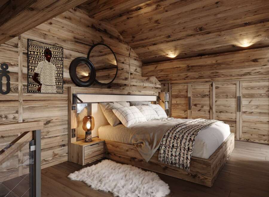 This stunning bedroom boasts a rustic-chic design with exposed wood beams, walls, and floors, creating a warm and inviting atmosphere.