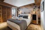 Experience luxury and comfort in this stunning bedroom.