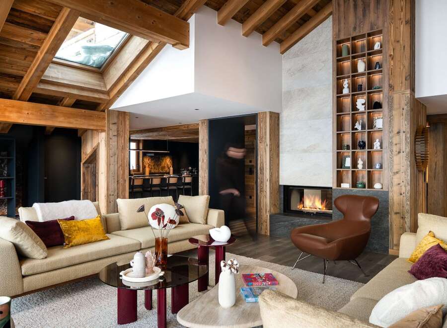 Experience luxury living in this stunning property featuring a cozy fireplace, perfect for chilly evenings.
