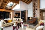 Experience luxury living in this stunning property featuring a cozy fireplace, perfect for chilly evenings.