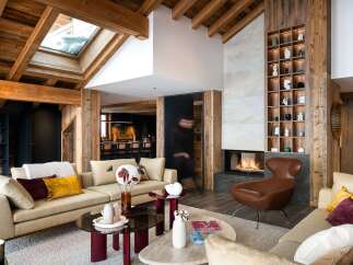 Experience luxury living in this stunning property featuring a cozy fireplace, perfect for chilly evenings.