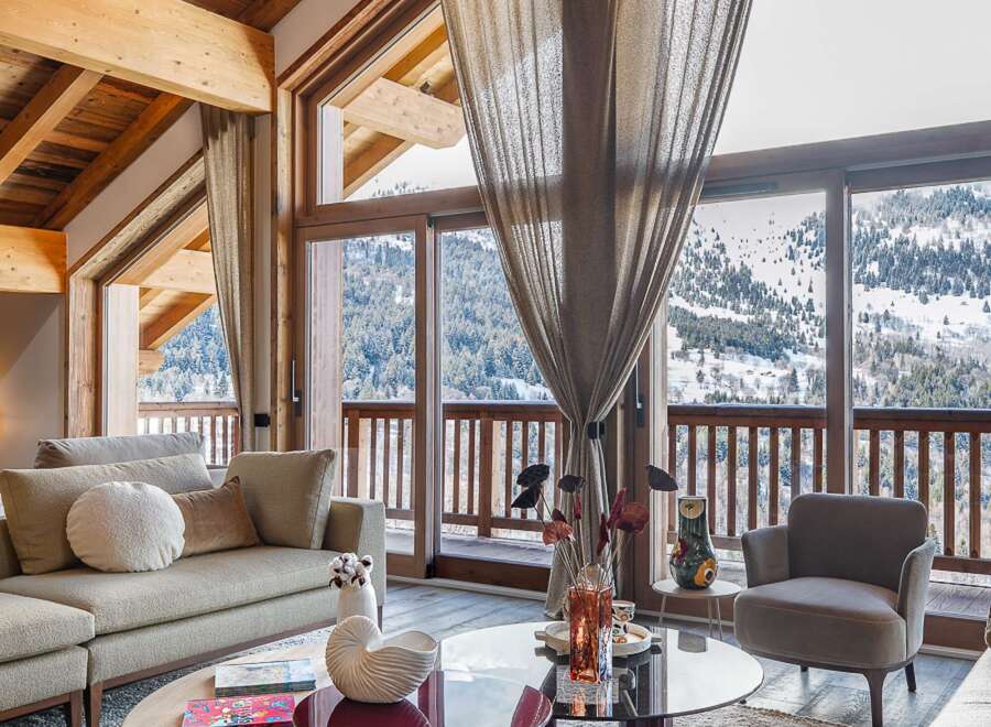 Experience luxury living in this stunning chalet with breathtaking mountain views.
