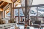 Experience luxury living in this stunning chalet with breathtaking mountain views.